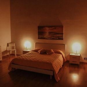 Kamer met een Queen Size Bed